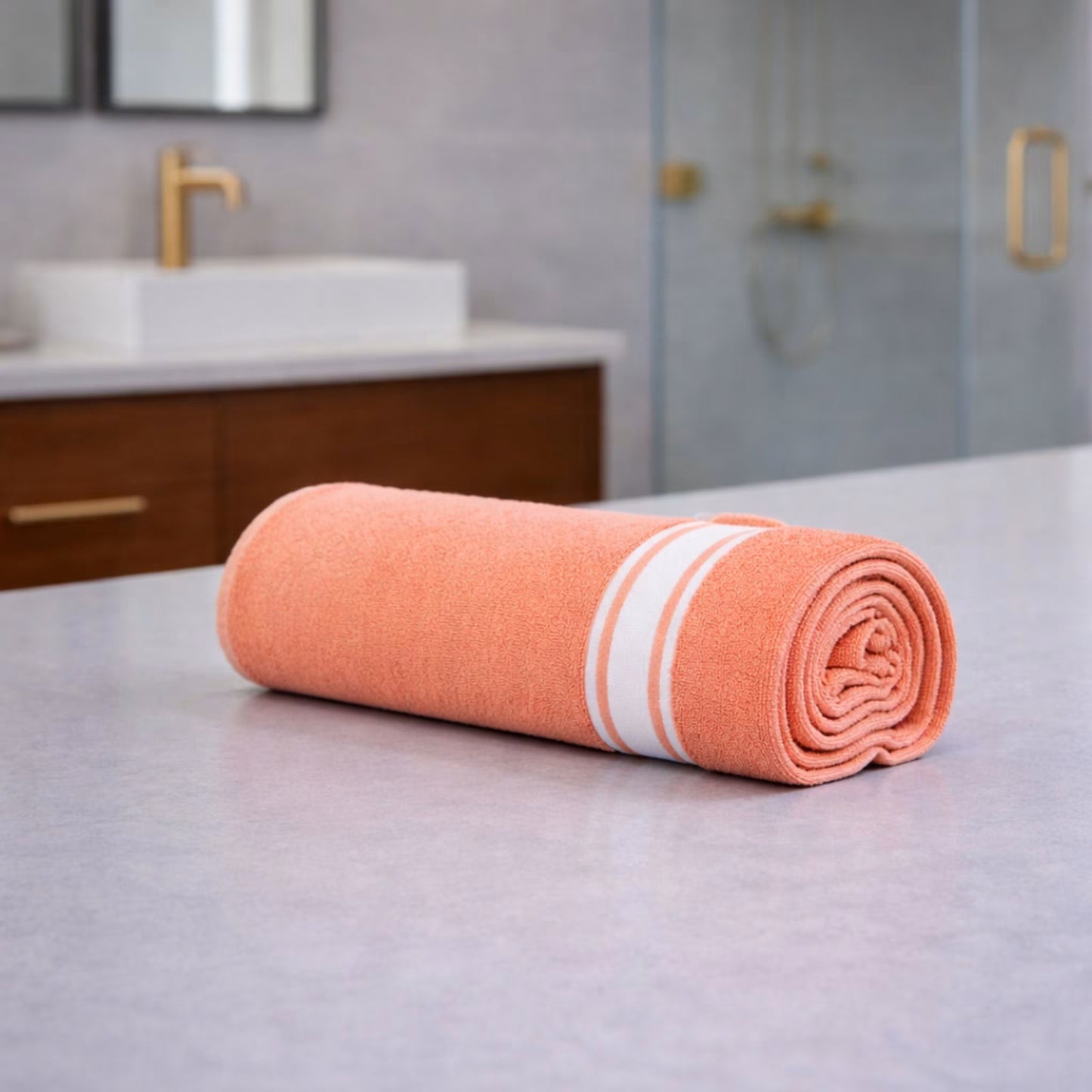 Rolled amethyst purple bamboo bath towel on bathroom countertop, 75x150 cm extra large bath towel
